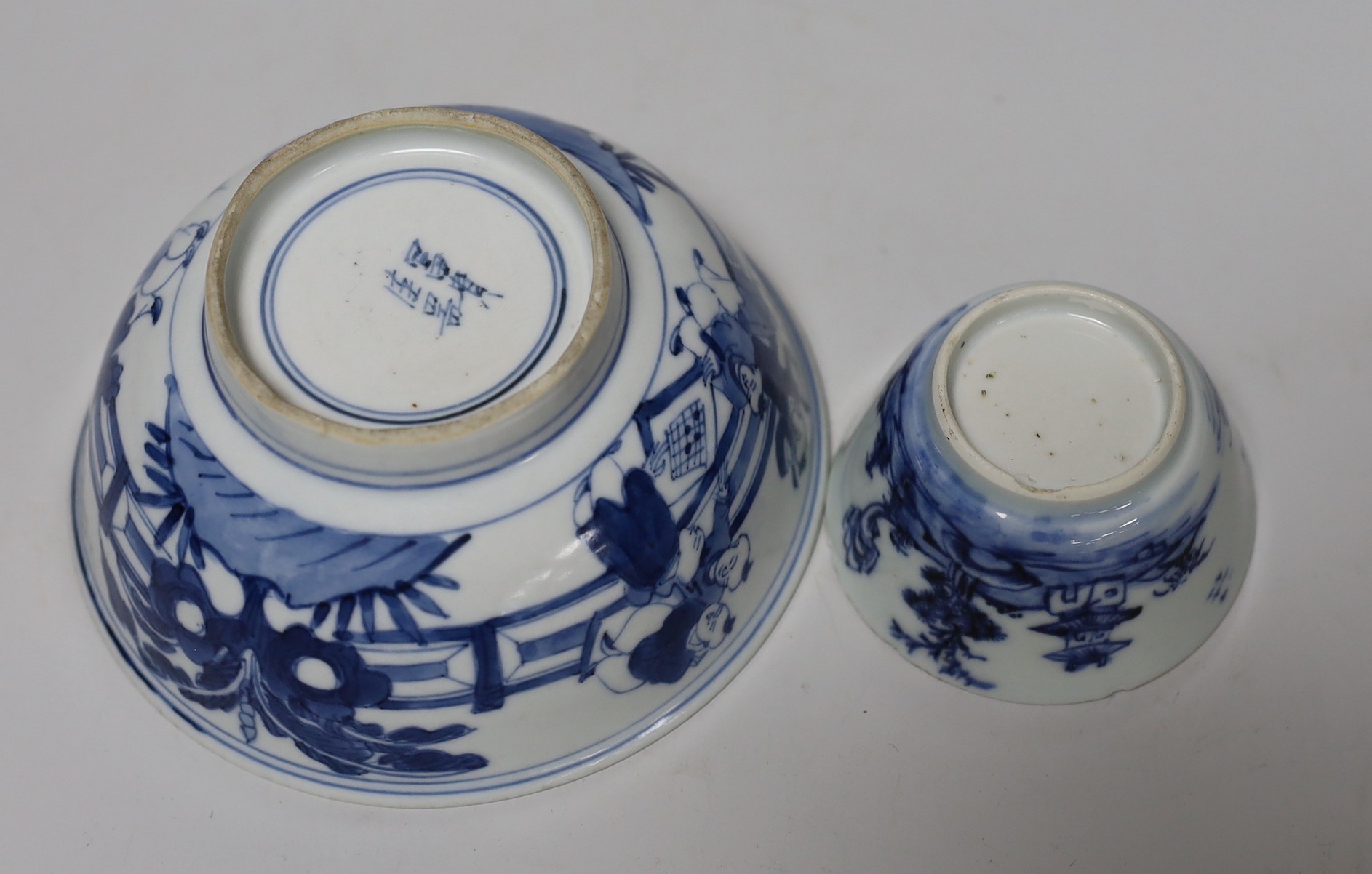 A Chinese Kangxi blue and white tea bowl and saucer, and a blue and white bowl, largest 13cm diameter
